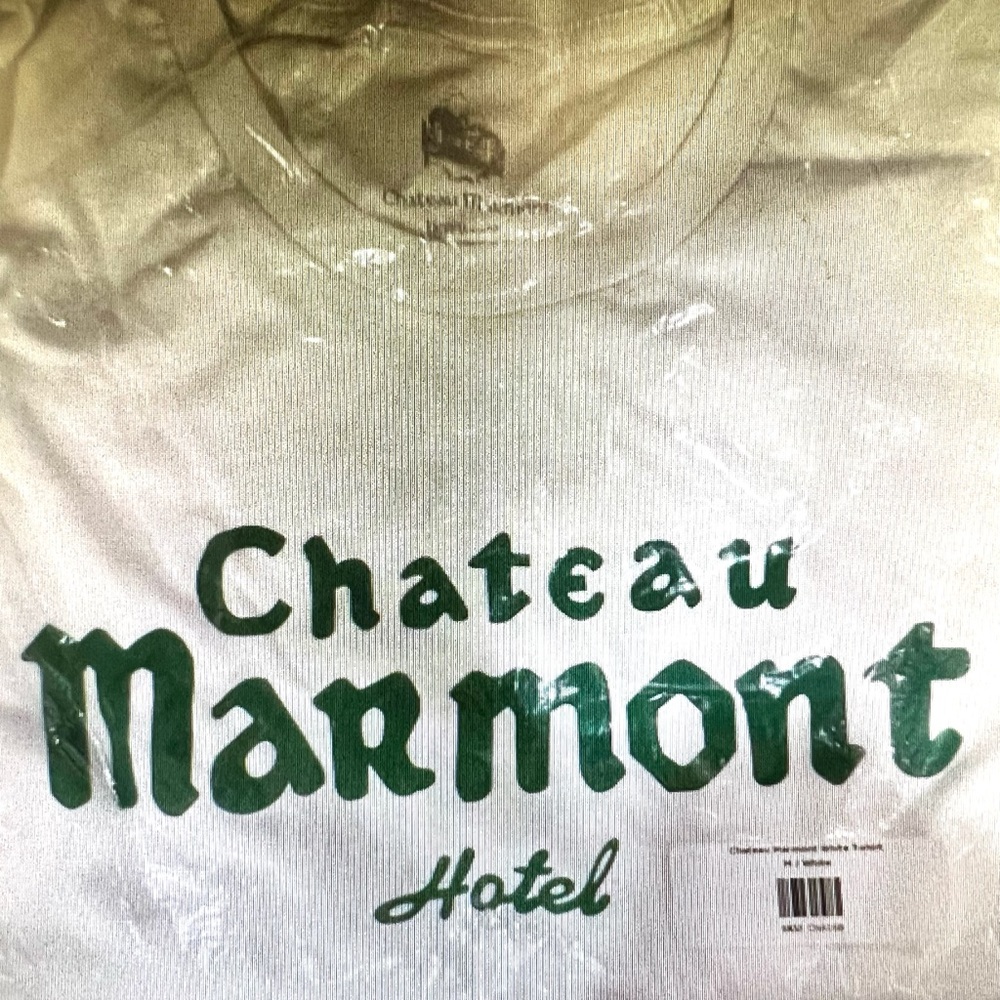 ISO. White with green lettering Chateau marmont Hotel Tshirt